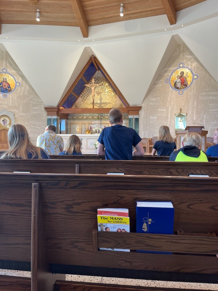 Students of St. Joseph Cathedral School in Jefferson City spend time in Adoration, praying for peace in the Cathedral during the Oct. 17 day of prayer and fasting for peace in the Holy Land.